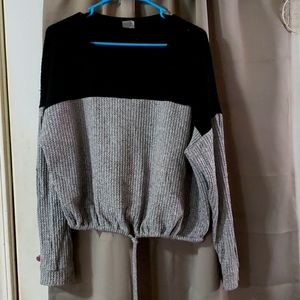 Cropped gray and black color block knit sweater